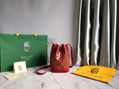 PETIT FLOT BUCKET BAG 22 IN CLASSIC RED GOYARDINE CANVAS AND LAMBSKIN TRIM
