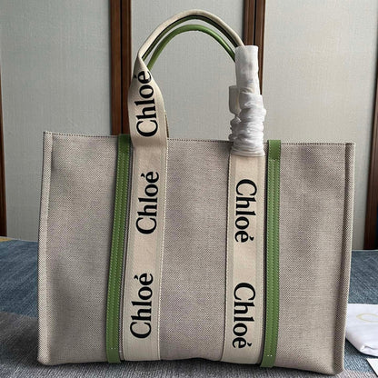 LAGRE WOODY TOTE BAG 45 IN BEIGE LINEN CANVAS BLACK WEBBING LOGO EMBROIDER GREEN CALFSKIN