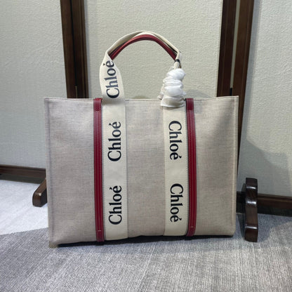 LAGRE WOODY TOTE BAG 45 IN BEIGE LINEN CANVAS BLACK WEBBING LOGO EMBROIDER RED CALFSKIN