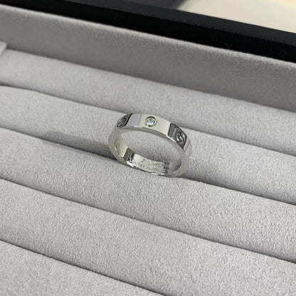 [AURORA]LIEBESRING 4MM 1 DIAMANT SILBER