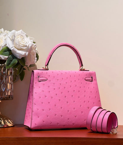 KELLY SELLIER 25 BAG IN DOLL PINK OSTRICH LEATHER WITH GOLD HARDWARE (MADE-TO-ODER)